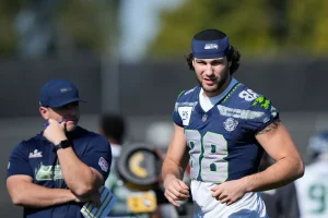 Sam Darnold’s Stunning TD Pass to AJ Barner Shocks Fans