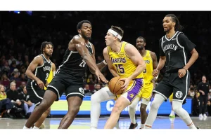 Austin Reaves Shines with 15 Points in Lakers Return