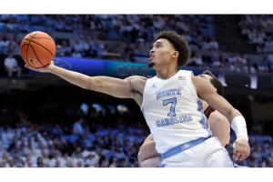 Mavericks’ P.J. Washington Exits Early with Ankle Injury