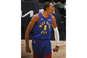 Nuggets’ Peyton Watson Exits with Hamstring Injury—MRI Pending