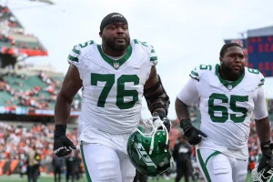 Ravens Reunite with John Simpson on $30M 3-Year Deal