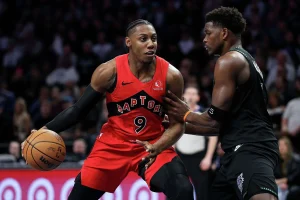 Edwards’ Slam Over Barrett Fuels Timberwolves’ 115-107 Win